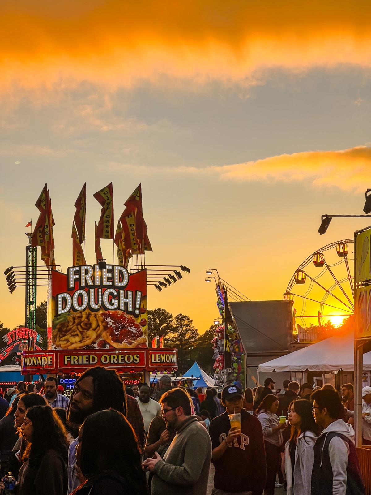 Sunset over the midway at the NC State Fair